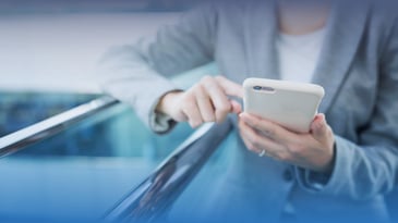Person interacting with their smartphone