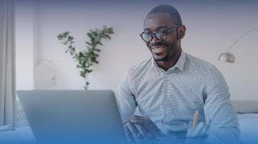 Black man on his laptop watching a LinkedIn Live from Claro hosted by Michael Beygelman