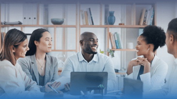 Multicultural business team meeting in an office.
